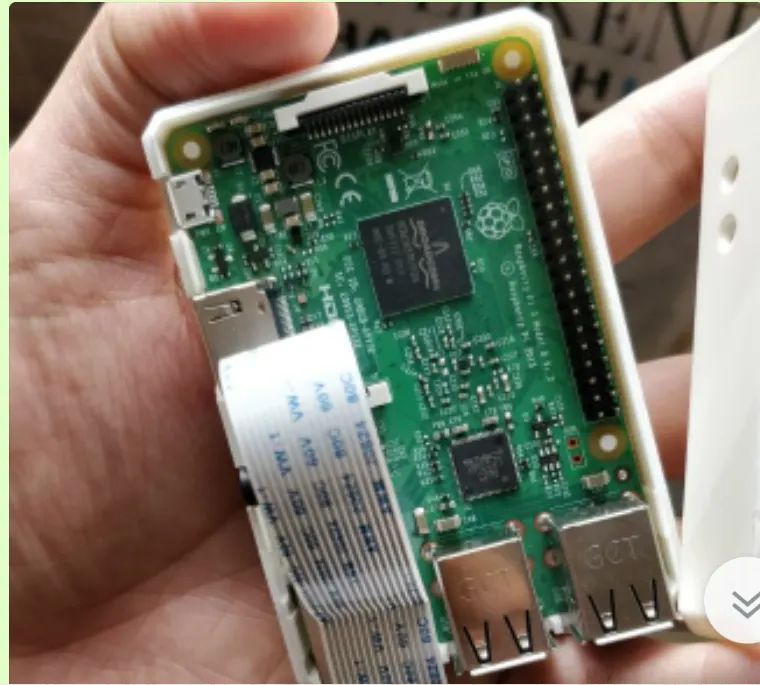 Raspberry Pi board with a ribbon-connected camera module