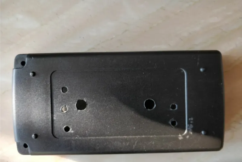 Locally sourced laptop-charger plastic shell used as a Raspberry Pi cover